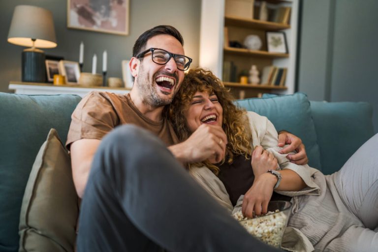 A couple enjoying watching tv with Truespeed full-fibre