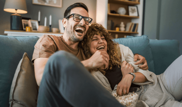 A couple enjoying streaming TV with Truespeed's ultrafast full-fibre