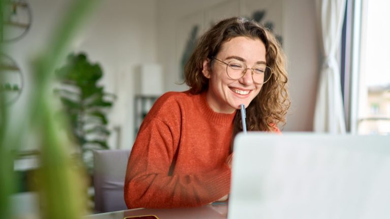 A women working at home with Truespeed's ultrafast full-fibre