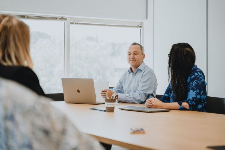 Truespeed team members in a meeting